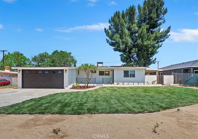 ranch-style home featuring concrete driveway, stucco siding, and an attached garage