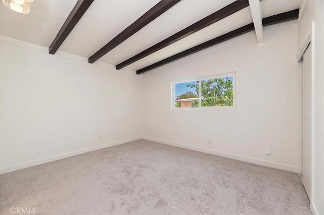 unfurnished bedroom with carpet floors and baseboards