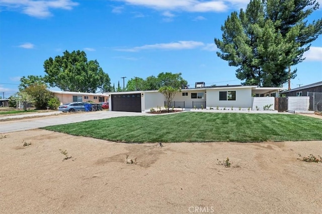 single story home with concrete driveway, a garage, and stucco siding