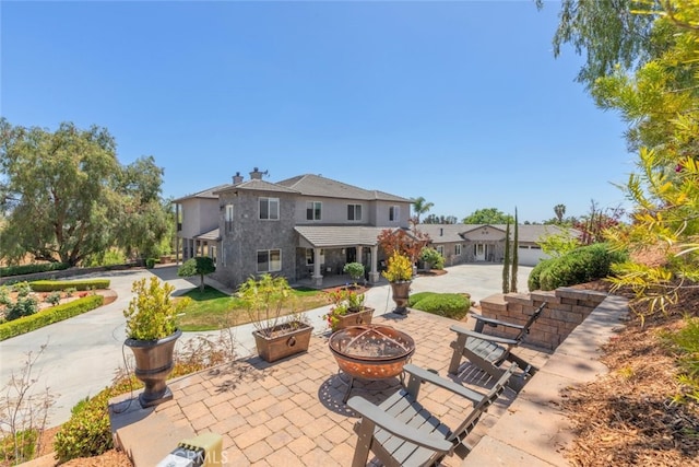 38855 Bella Vista Rd, Temecula, CA 92592 - view of patio featuring a fire pit