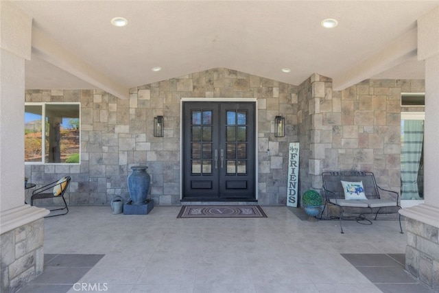 38855 Bella Vista Rd, Temecula, CA 92592 - entrance to property featuring french doors, stone siding, and a patio