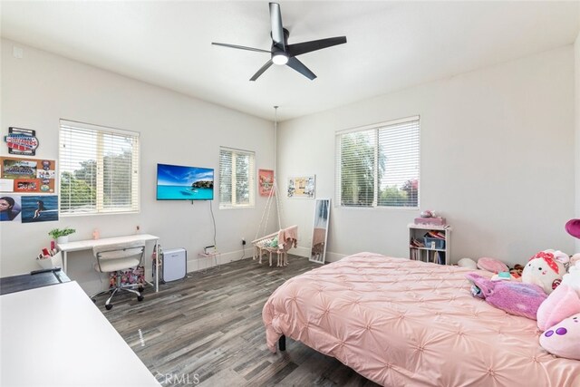 38855 Bella Vista Rd, Temecula, CA 92592 - bedroom featuring multiple windows, wood finished floors, a desk, and a ceiling fan