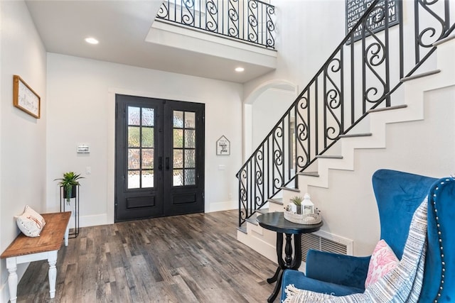 38855 Bella Vista Rd, Temecula, CA 92592 - foyer entrance with french doors, wood finished floors, stairway, arched walkways, and recessed lighting