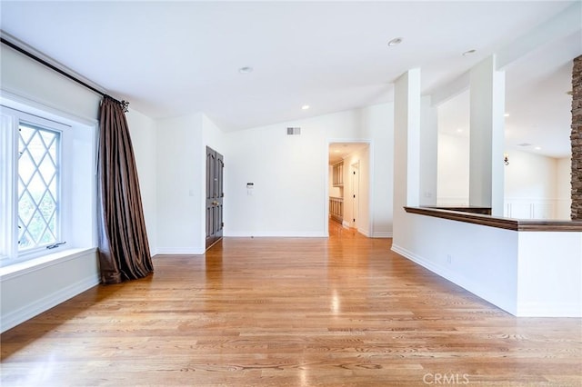18337 Chatham Ln, Porter Ranch, CA 91326 - spare room featuring vaulted ceiling and light wood-style floors