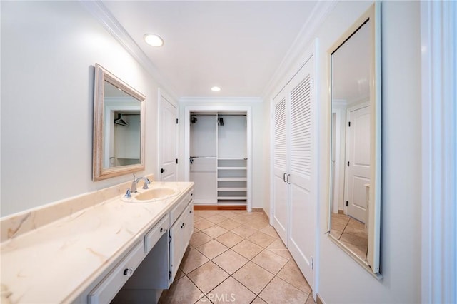 18337 Chatham Ln, Porter Ranch, CA 91326 - bathroom featuring a closet, vanity, tile patterned flooring, crown molding, and recessed lighting