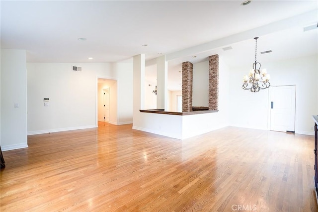 18337 Chatham Ln, Porter Ranch, CA 91326 - unfurnished living room featuring a chandelier, light wood-style floors, vaulted ceiling, and recessed lighting