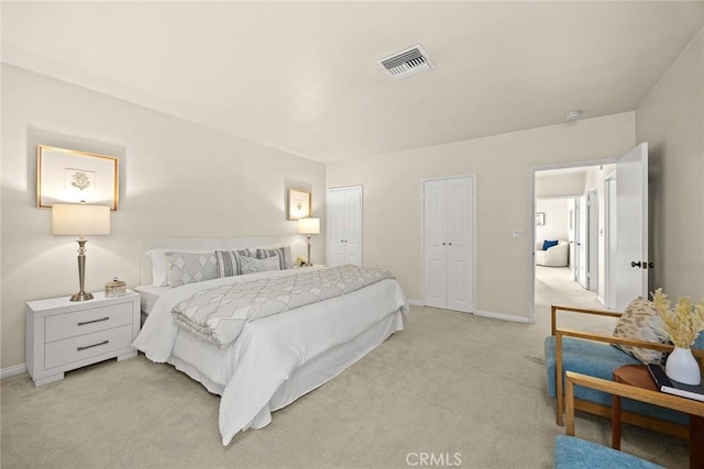 468 Gerona Ave, San Gabriel, CA 91775 - bedroom featuring light colored carpet, two closets, and baseboards