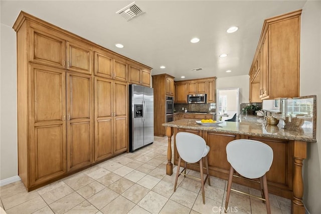 468 Gerona Ave, San Gabriel, CA 91775 - kitchen with stainless steel appliances, a peninsula, recessed lighting, a sink, and tasteful backsplash