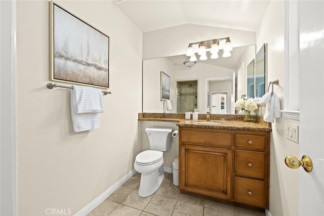 468 Gerona Ave, San Gabriel, CA 91775 - bathroom with vaulted ceiling, toilet, tile patterned floors, baseboards, and vanity