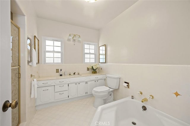 468 Gerona Ave, San Gabriel, CA 91775 - full bathroom with wainscoting, toilet, a bath, vanity, and tile walls
