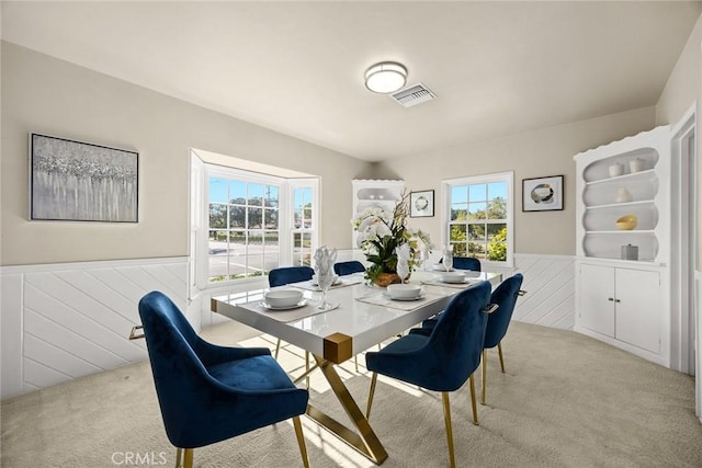 468 Gerona Ave, San Gabriel, CA 91775 - carpeted dining room with wainscoting and plenty of natural light