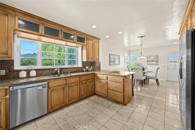 468 Gerona Ave, San Gabriel, CA 91775 - kitchen with stainless steel appliances, a sink, decorative backsplash, a peninsula, and light tile patterned floors