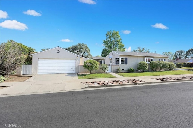 468 Gerona Ave, San Gabriel, CA 91775 - ranch-style house featuring a garage, driveway, and stucco siding