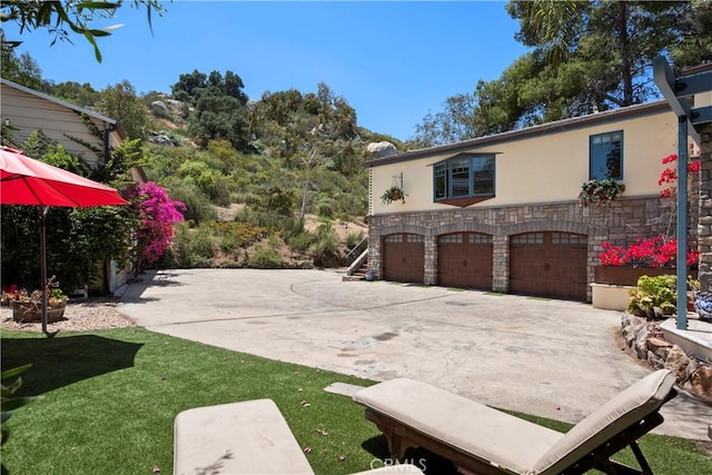 1961 Forester Creek Rd, El Cajon, CA 92021 - view of yard featuring a garage and driveway