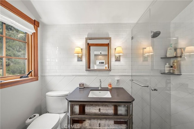 1961 Forester Creek Rd, El Cajon, CA 92021 - bathroom with vanity, toilet, a tile shower, and tile walls