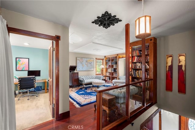 1961 Forester Creek Rd, El Cajon, CA 92021 - living area with a desk, wood finished floors, and baseboards