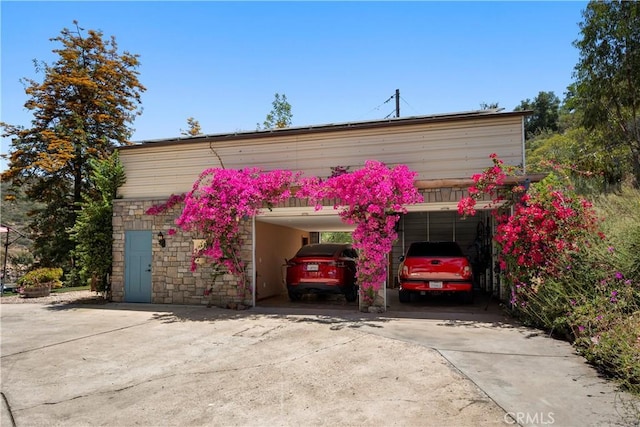 1961 Forester Creek Rd, El Cajon, CA 92021 - garage with driveway and a carport
