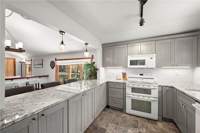 1961 Forester Creek Rd, El Cajon, CA 92021 - kitchen with white appliances, gray cabinetry, decorative backsplash, stone finish flooring, and light stone countertops