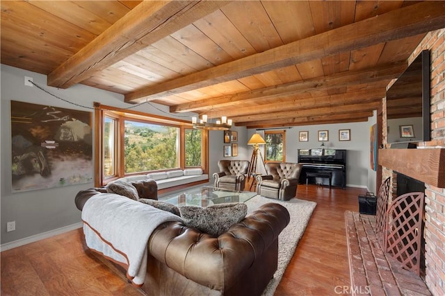 1961 Forester Creek Rd, El Cajon, CA 92021 - living area featuring wood ceiling with exposed beams, baseboards, wood finished floors, a fireplace, and a chandelier