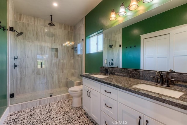 5981 Kibler Rd, Paradise, CA 95969 - bathroom featuring a shower stall, toilet, double vanity, and tile patterned floors