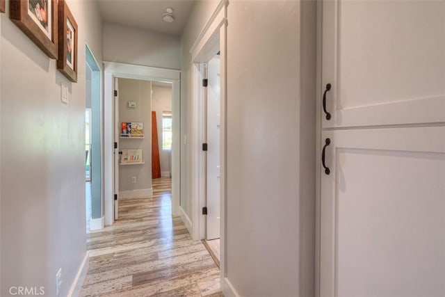 5981 Kibler Rd, Paradise, CA 95969 - hallway with light wood-style flooring and baseboards