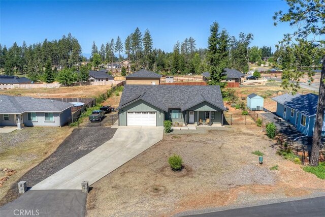 5981 Kibler Rd, Paradise, CA 95969 - single story home with driveway, an attached garage, a residential view, and a shingled roof