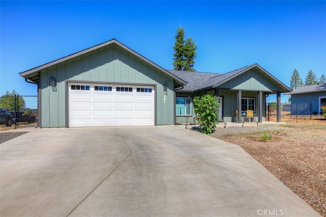 5981 Kibler Rd, Paradise, CA 95969 - ranch-style house featuring board and batten siding, a garage, and driveway