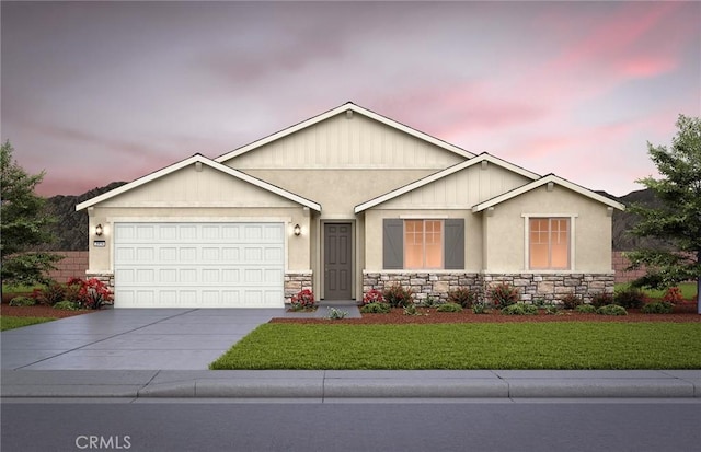 4192 Larchwood Ln, Lake Elsinore, CA 92530 - view of front of property with stone siding, driveway, a garage, and a lawn
