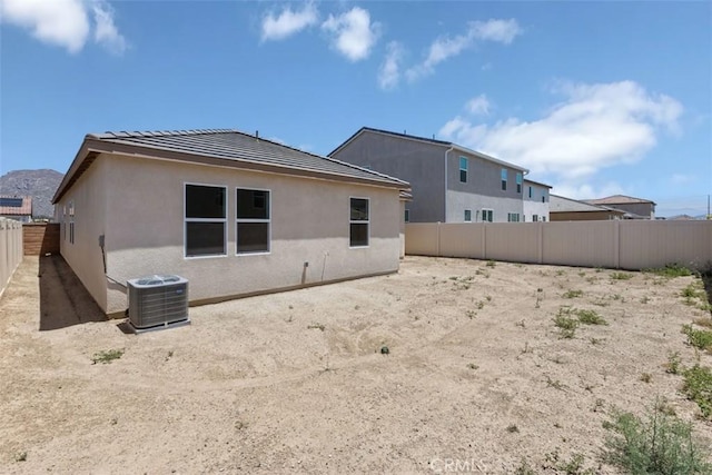 30773 Vera Cruz Cir, Winchester, CA 92596 - back of house with a fenced backyard and stucco siding