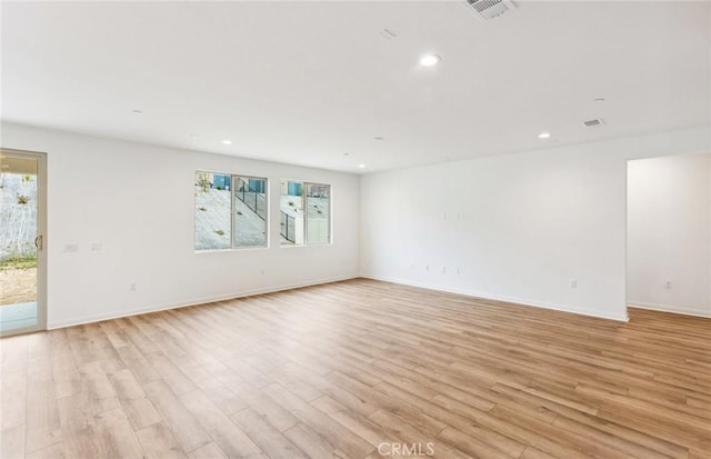 4180 Larchwood Ln, Lake Elsinore, CA 92530 - unfurnished room with light wood-type flooring, recessed lighting, and baseboards