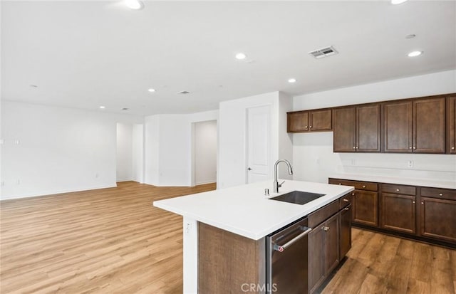 4180 Larchwood Ln, Lake Elsinore, CA 92530 - kitchen with a sink, light wood-type flooring, dishwasher, recessed lighting, and light countertops