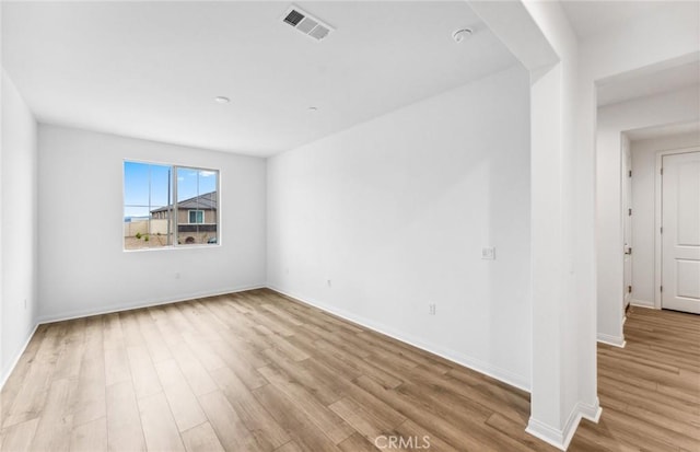 4180 Larchwood Ln, Lake Elsinore, CA 92530 - spare room featuring wood finished floors and baseboards