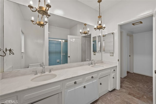 10835 Savona Rd, Los Angeles, CA 90077 - full bath featuring a shower stall, a chandelier, double vanity, and toilet