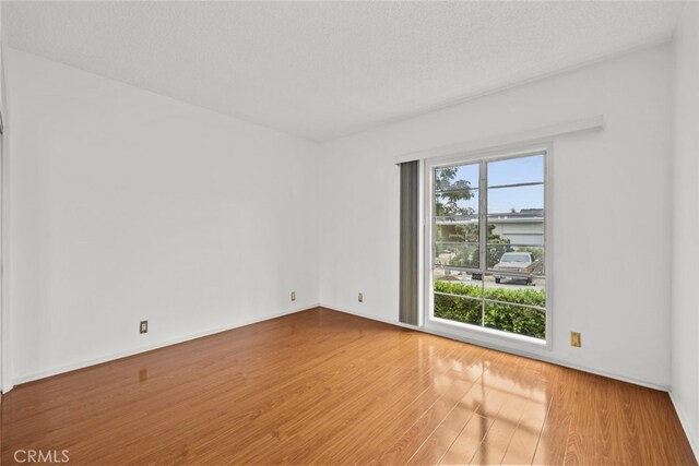 10835 Savona Rd, Los Angeles, CA 90077 - empty room with wood finished floors