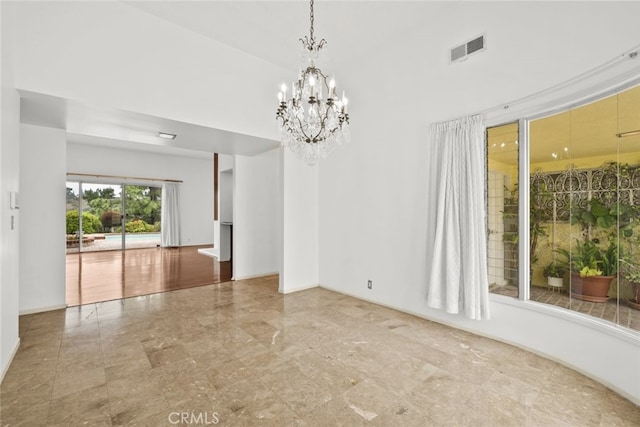 10835 Savona Rd, Los Angeles, CA 90077 - empty room featuring a chandelier