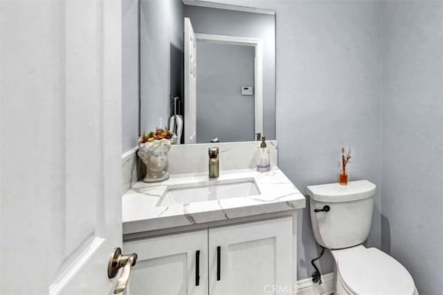 21772 Windsong Cir, Huntington Beach, CA 92646 - half bathroom with vanity and toilet