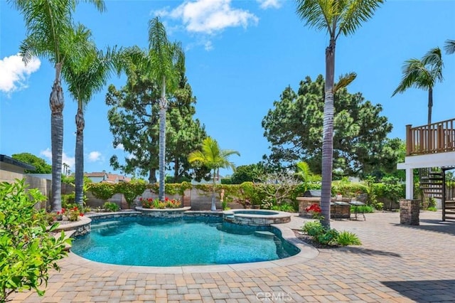 21772 Windsong Cir, Huntington Beach, CA 92646 - view of swimming pool with a patio area, a fenced backyard, and a pool with connected hot tub