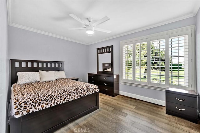 21772 Windsong Cir, Huntington Beach, CA 92646 - bedroom with baseboards, wood finished floors, crown molding, and a ceiling fan