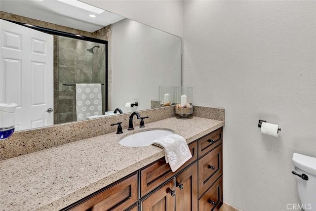21772 Windsong Cir, Huntington Beach, CA 92646 - bathroom featuring toilet, vanity, and a shower stall