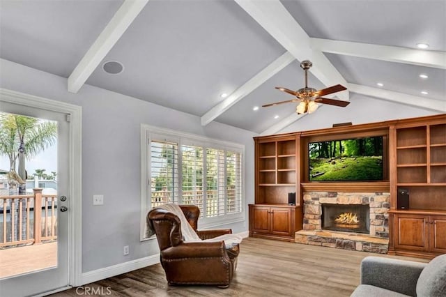 21772 Windsong Cir, Huntington Beach, CA 92646 - living area featuring wood finished floors, a fireplace, ceiling fan, baseboards, and recessed lighting