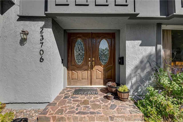 23706 Mill Valley Rd, Valencia, CA 91355 - property entrance with stucco siding