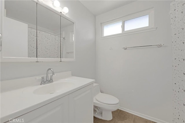 23706 Mill Valley Rd, Valencia, CA 91355 - bathroom with toilet, vanity, tile patterned floors, a shower, and baseboards