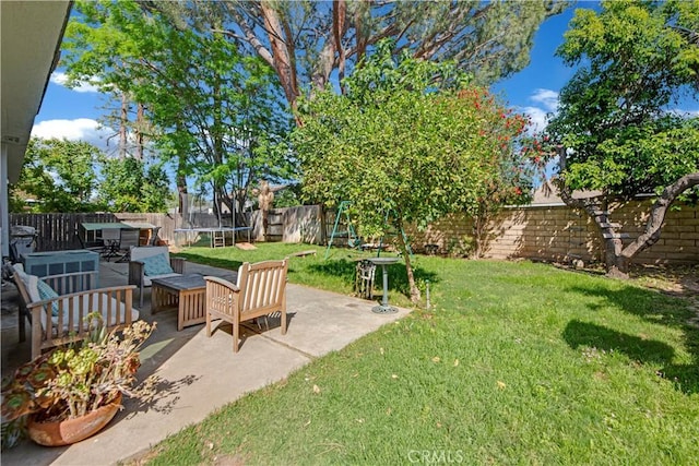 23706 Mill Valley Rd, Valencia, CA 91355 - view of yard with a trampoline, a patio, and cooling unit