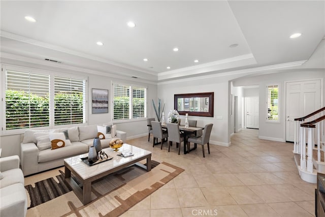 43 Flintridge, Ladera Ranch, CA 92694 - living room with a tray ceiling, plenty of natural light, light tile patterned floors, recessed lighting, and baseboards