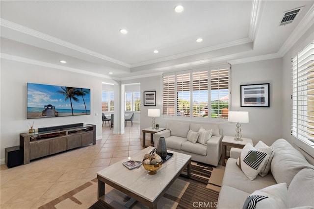43 Flintridge, Ladera Ranch, CA 92694 - living area featuring a tray ceiling, light tile patterned floors, plenty of natural light, recessed lighting, and ornamental molding