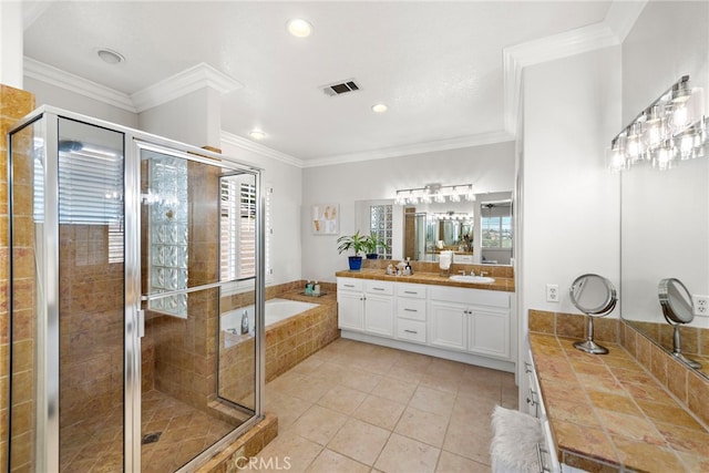 43 Flintridge, Ladera Ranch, CA 92694 - full bathroom with a shower stall, a garden tub, tile patterned flooring, double vanity, and recessed lighting