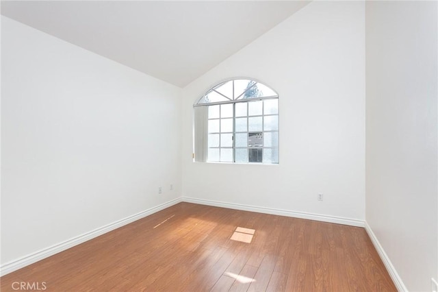 18 Fano St Unit 2, Arcadia, CA 91006 - unfurnished room featuring wood finished floors, lofted ceiling, and baseboards