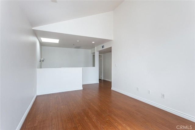 18 Fano St Unit 2, Arcadia, CA 91006 - spare room with baseboards, wood finished floors, and high vaulted ceiling
