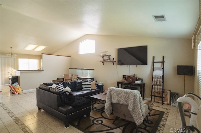 310 Buena Vista Ct, Merced, CA 95348 - tiled living room with healthy amount of natural light, vaulted ceiling, and baseboards