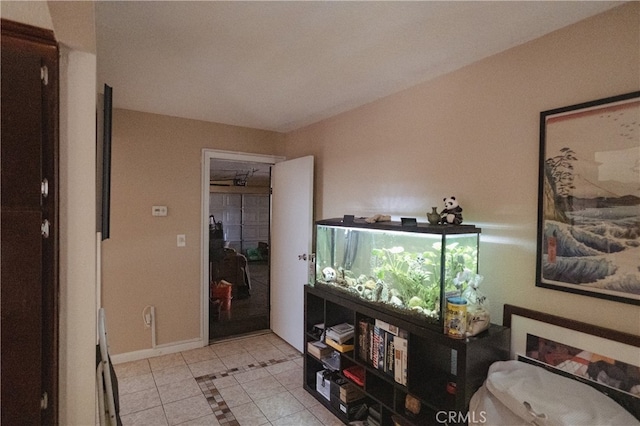 310 Buena Vista Ct, Merced, CA 95348 - entrance foyer with light tile patterned floors, inlaid floor details, and baseboards